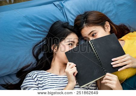 A Top View Photo Close Up To Couple Asian Woman Are Lesbian Sleeping Ont The Blue Bed. Couple Concep
