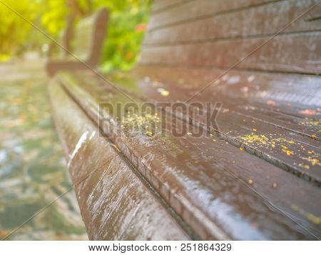 Close Up Chair In The Park After The Rain,wet Chair In The Park