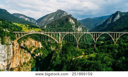 Aerial View Of Durdevica Tara Arc Bridge In The Mountains, One Of The Highest Automobile Bridges In 
