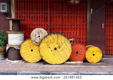 The Wooden Cable Core In Front Of The Hardware Store