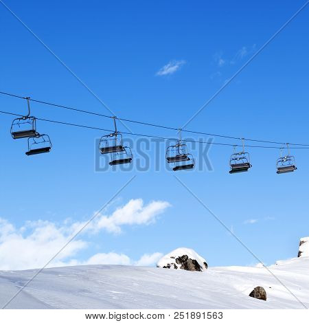 Chair-lift And Blue Sky At Evening. Caucasus Mountains In Winter, Shahdagh, Azerbaijan. Square Photo
