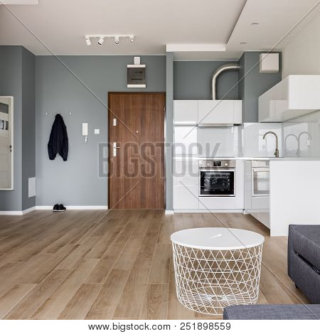 Modern Studio Flat With Small, White Kitchen, Corridor And Living Room
