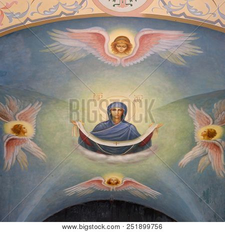 Kuremae, Estonia - 27 July 2018: Icons In The Arch Of The Saint Gate With Belfry. Puhtitsa Dormition