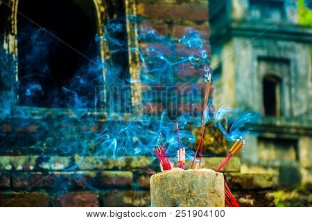 Incense Sticks In The Buddhist Bich Dong Pagoda Complex, Tam Coc, Ninh Binh In Vietnam