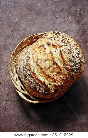 Fresh Homemade Bread On A Dark Background. Crisp. French Bread.  Bread At Leaven. Unleavened Bread