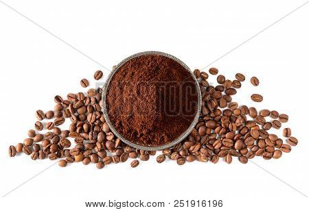 Ground Coffee On Silver Plate And Coffee Beans Isolated On White Background Top View.