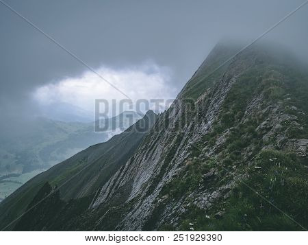 Scary Steep Mountain Scenery Covered In Fog In The Swiss Alps Brienzer Rothorn Switzerland