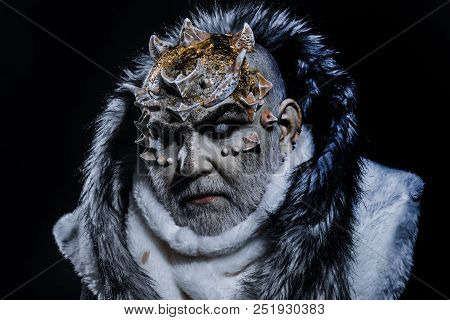 Dark Arts Concept. Senior Man With White Beard Dressed Like Monster. Demon On Black Background, Clos