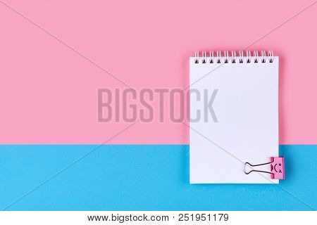 Top View Of Blank Notebook On Colorful Background