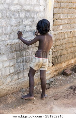 Pondichery, Puducherry, Tamil Nadu, India - March Circa, 2018. Unidentified Small Indian Barefoot Bo