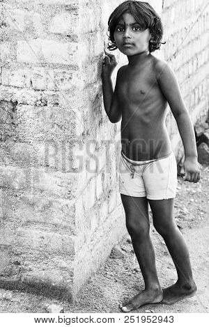 Pondichery, Puducherry, Tamil Nadu, India - March Circa, 2018. Unidentified Small Indian Barefoot Bo