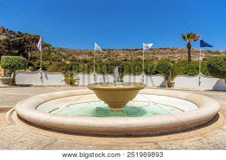 Circular Water Fountain In Front Of Kallthea Terms On Rhodes Island. Greece