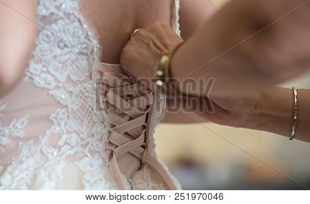Beautiful Bride With Fashion Wedding Hairstyle - On White Background.closeup Portrait Of Young Gorge