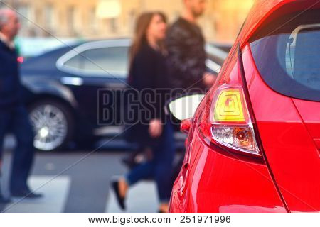 Traffic Laws For A Safety Of People. Pedestrians Walk Along A Crosswalk In A Lunch Hour. Peak Hour I