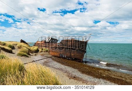 Wreck of Amadeo steamship build in 19th century in United Kingdom is since 1932 beached near Estancia San Gregorio, Chile