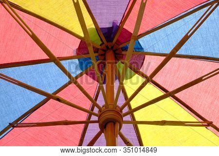 Umbrella Tube, Stretcher And Runner, Under And Inside Colorful Brolly