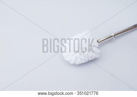 Toilet Brush On Grey Background.copy Space .