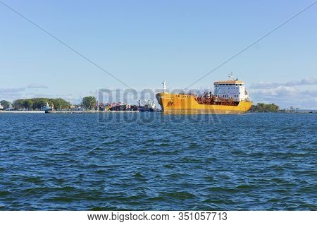 Orange Container Ship, Cargo Ship On The Roadstead, Baltiysk, Kaliningrad Region, Russia, October 5,