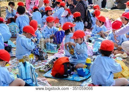 Osaka , Japan - October 29, 2009: Japanese Pre-school Kids Are Unpacking Their Lunch Boxes During An