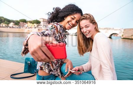 Multiethnic Girlfriends Taking Selfie At City Park Together - Friendship Concept With Happy Girls At