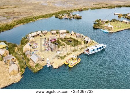 Aerial View Of Floating Village In Uros Islands At Titicaca Lake In Peru - Wanderlust And Travel Con