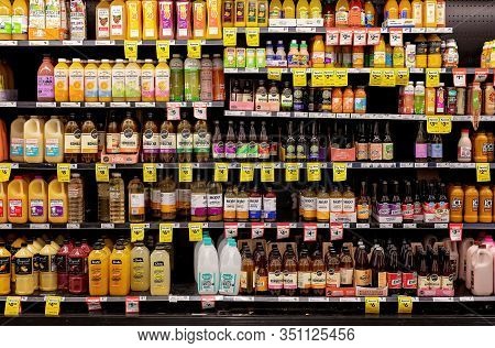 Walkerston, Queensland, Australia - February 2020: Bottled Juices For Sale On Shelves In Woolworths 