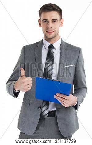 Happy businessman holding a fascicule with documents and giving thumb up isolated on white background