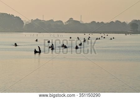 Mandalay, Myanmar - Nov 12, 2019: Fishermen Near U Bein Bridge In Amarapura,mandalay Myanmar