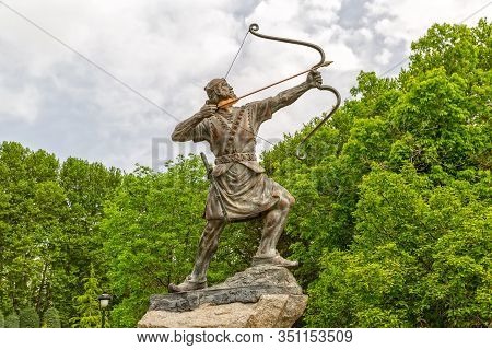 Tehran, Iran - May 1, 2015: Statue Of Aresh Kamangir The Archer In The Niavaran Palace Complex Garde