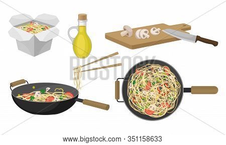 Asian Wok Udon Noodles In Paper Box And In Frying Pan With Sliced Vegetable Ingredients Side View Ve