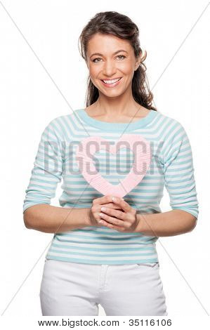 Smiling middle aged woman wird heart