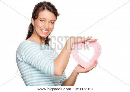 Smiling middle aged woman wird heart