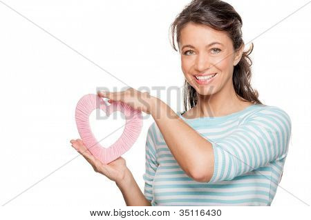 Smiling middle aged woman wird heart