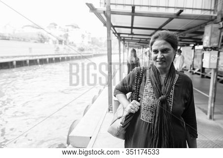 Portrait Of Mature Beautiful Indian Woman Exploring The City