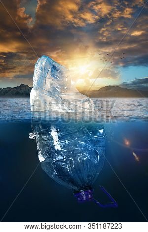 Pollution, Pastic Bottle Floating In The Sea Like An Iceberg