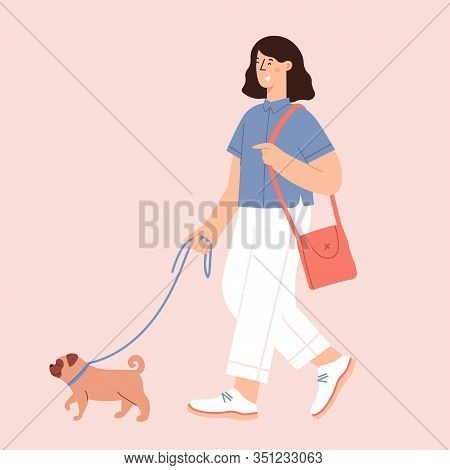 Young Woman Walking With Their Small Pet