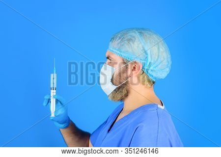 Injection. Treatment In Hospital. Doctor With Syringe Preparing For Injection. Vaccination For Peopl