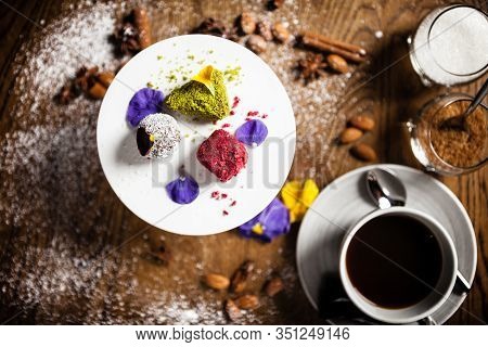 Vegan Truffles Dessert Served On A Plate In Restaurant
