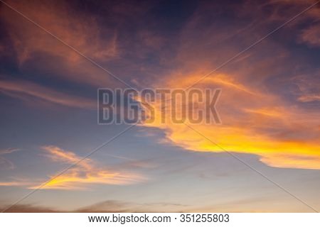 Arafura Sea, Australia - December 2, 2009: Red Sunset With Brown To Orange And Yellow Clouds In Ligh