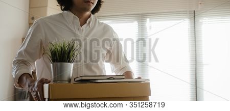 Panoramic Banner. Losing Job. Stressed Asian Young Employee Business Man Leaving The Office With His