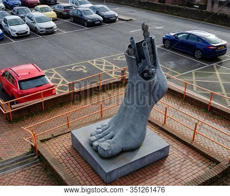 Flint, Uk: Feb 11, 2020: The Public Sculpture By Brian Fell, Named Footplate, Stands Beside A Railwa