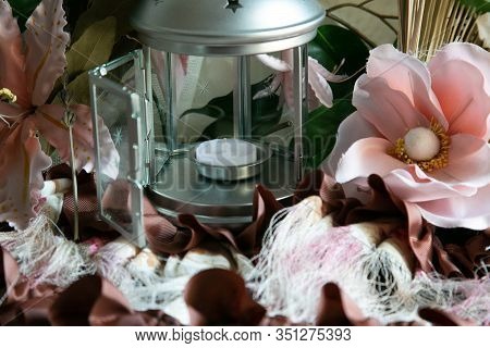 Decoration With Lantern And Pink Flowers For Weddings