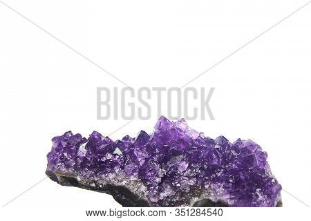 Amethyst Crystals Geode Isolated On White Background. Stock Photo
