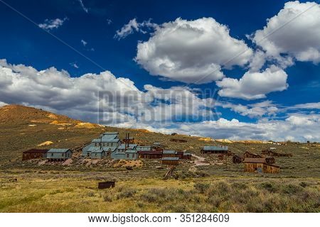 View Of The Bodie, Ghost Town. Bodie State Historic Park. Abandoned Wooden Houses And Standard Conso