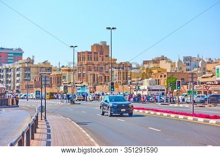 Dubai, UAE - January 31, 2020:  Street along waterfront in Deira district in Dubai, United Arab Emirates                           