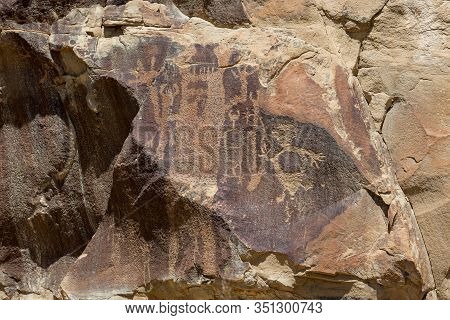 Strange Shapes And Figures That Have Been Carved Into The Ancient Sandstone Rocks At Legend Rock Sta