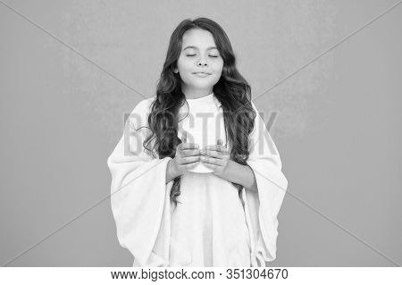 Happy Morning. Comfy Outfit For Weekend Rest At Home. Comfy Style. Kid Wearing Soft Poncho Drinking 