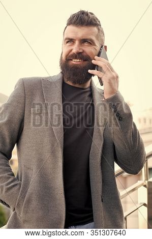 Share Information By Verbal Communication. Bearded Man Has Business Talks On Smartphone. Business Co