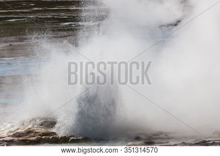 The Formation Of Clepsydra Geyser As Its Shoots Hot Water And Steam Into The Air At Yellowstone Nati