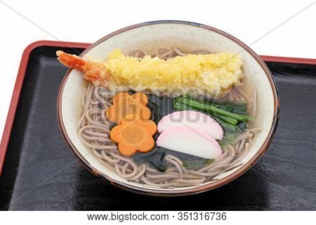 Japanese Tenpura Soba Noodles In A Bowl With Chopsticks On Tray
